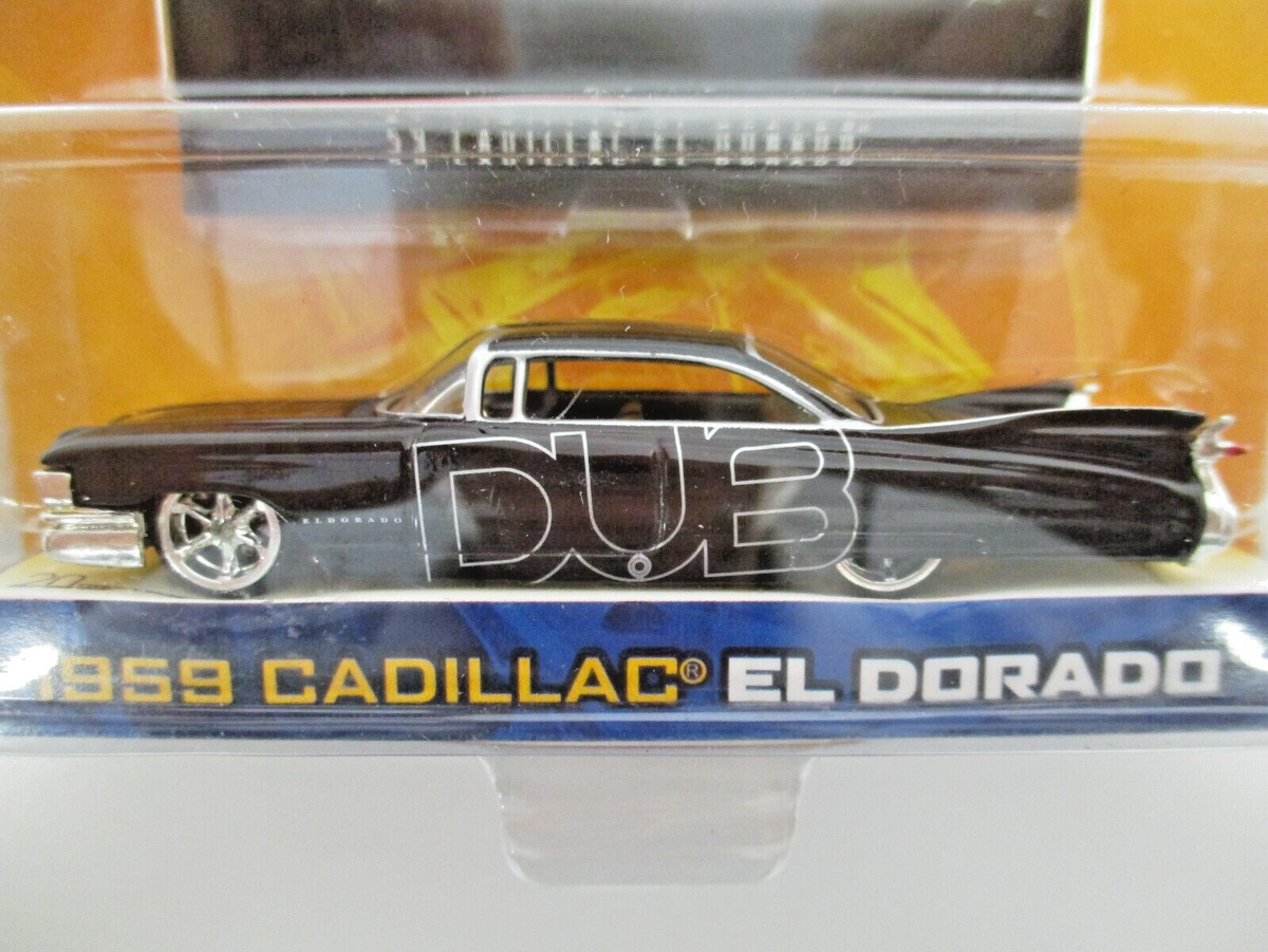1956 Cadillac Eldorado　ローライダー　ミニカー Amazon.com: Jada Toys M&M's 1:24 1956 Cadillac El Dorado Die