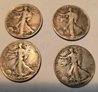 walking liberty half dollars, one 1941, one 1943, two 1944..