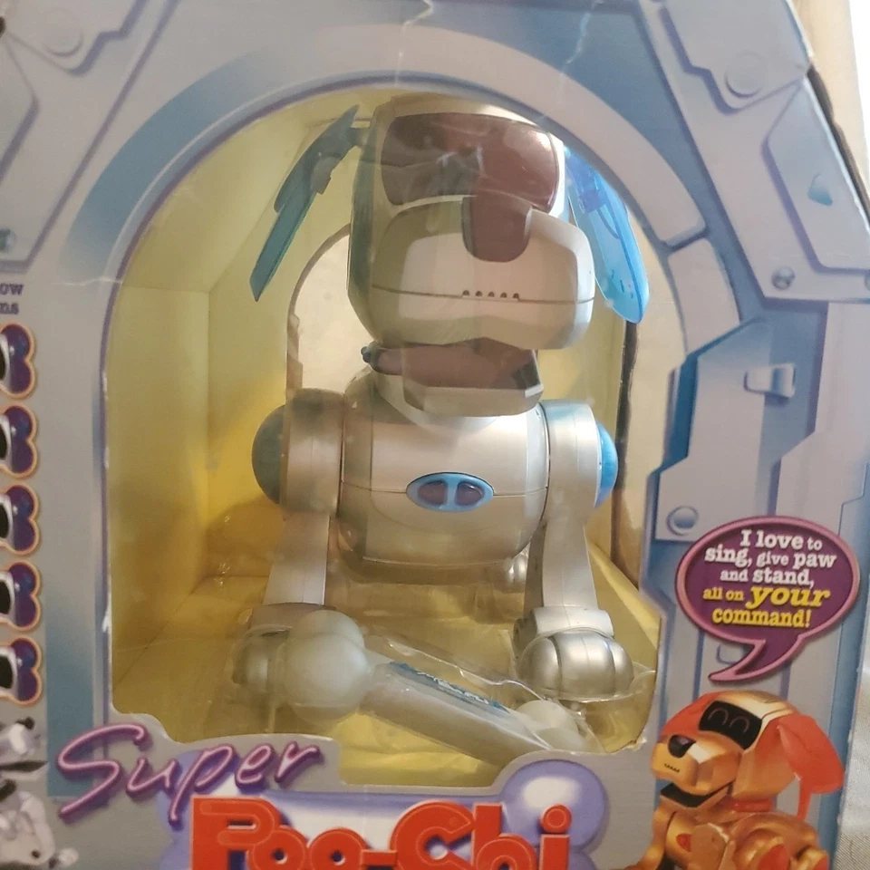 Super Poo-chi 2000, A Robo-chi Pets de Tiger Electronics, plateado y azul con hueso Foto 2 de 4