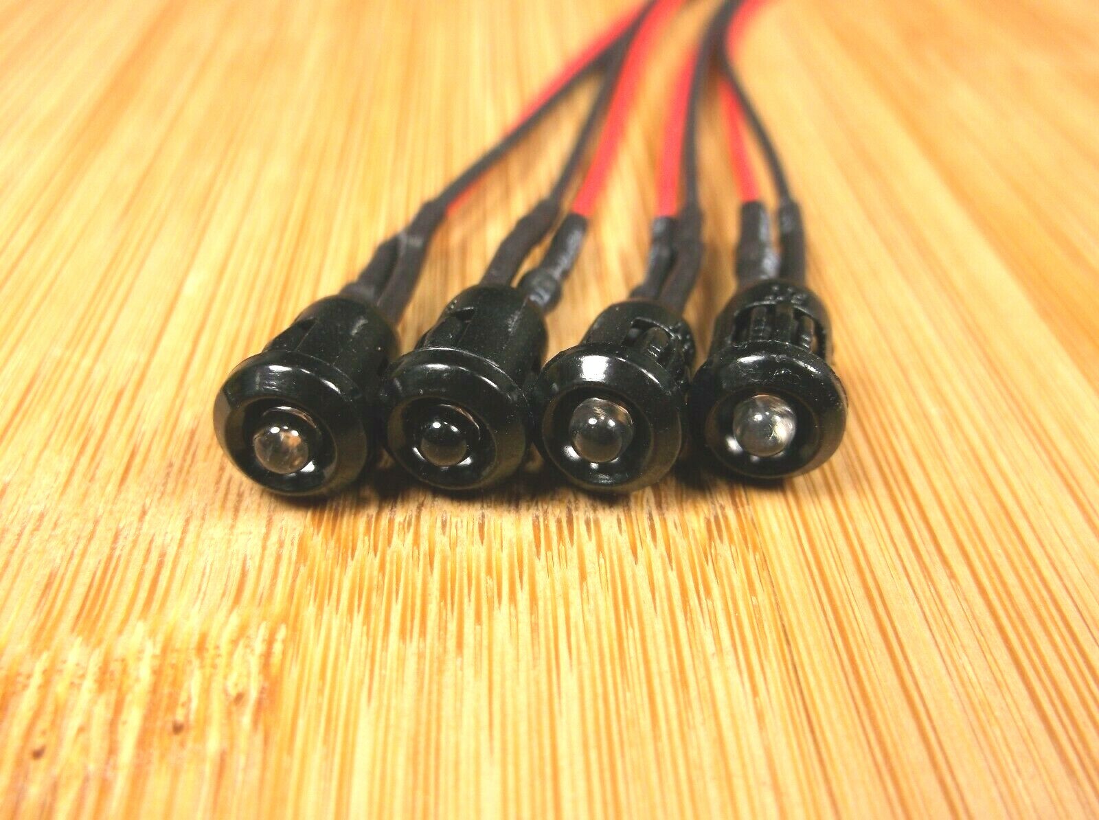 4 BBT 12 volt Yellow LED Pilot Lights in Black Bezels