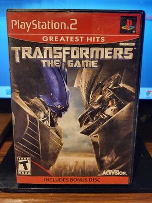 TRANSFORMERS THE GAME PS2 (PlayStation 2, 2007) Complete With Manual, Bonus Disc