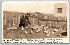 Vintage c1912 PPC Postcard - Man with Chicks in Wooden Fenced Pen