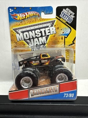 (BT6) 1/64 Hot Wheels Monster Jam BLACKSMITH tattoo 73/80 2011