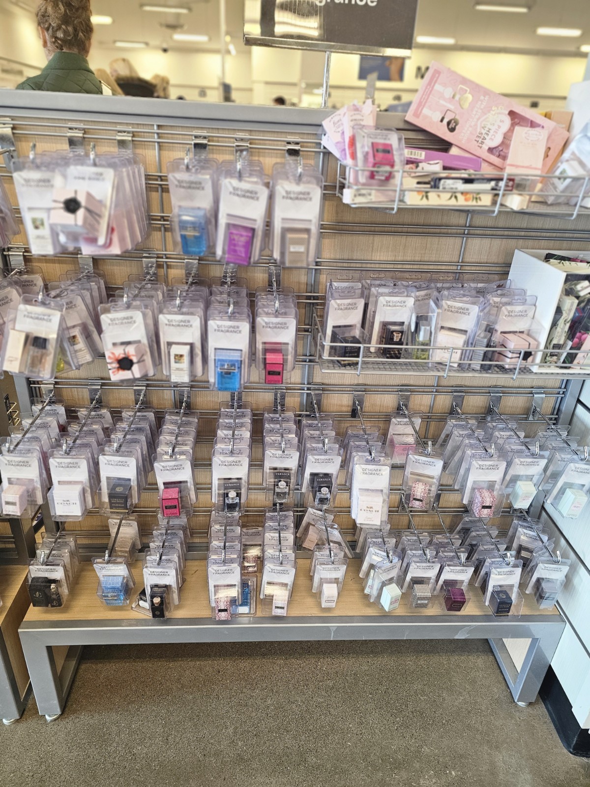 Men And Women Look At Photos For Prices Nib