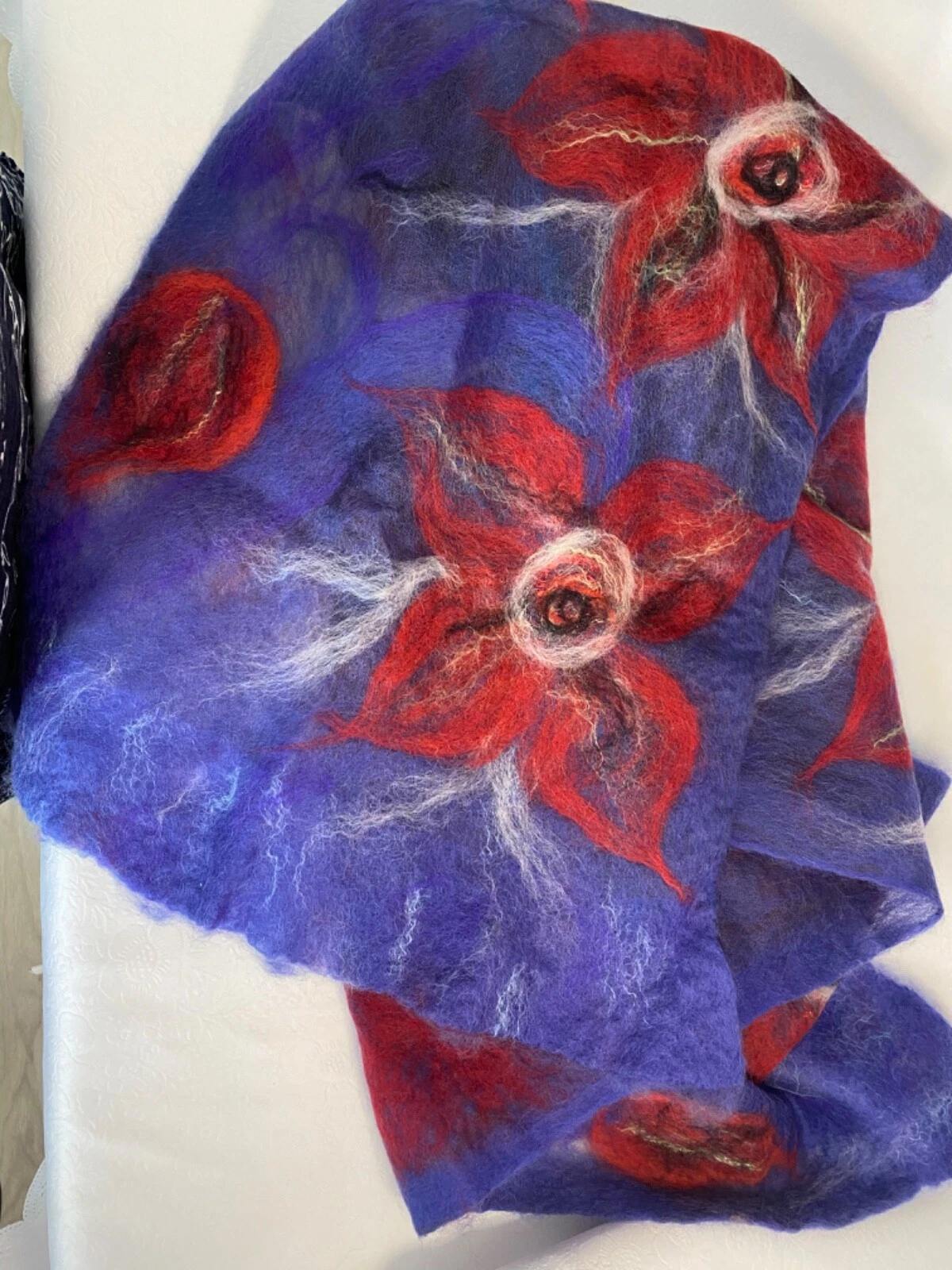 Title: “Handcrafted Blue Wool Scarf with Red Accents – Unique Artisan Design”