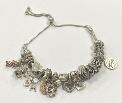 original PANDORA Armband reguliert 18 Charms inkl. seltenes Disney 64g Gewicht gesamt