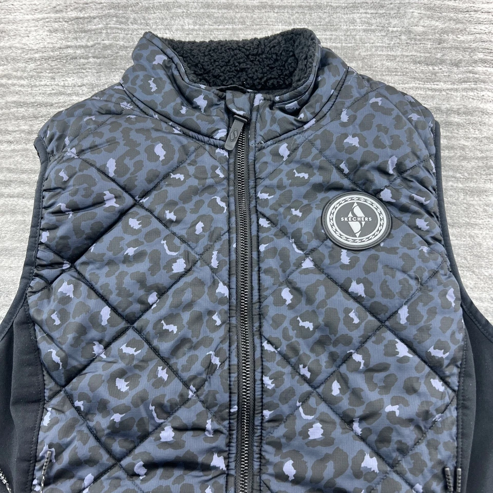 Chaleco Skechers Talla L Jóvenes Niñas Leopardo Puffer Chaqueta Cremallera Completa Azul Negro Foto 2 de 4