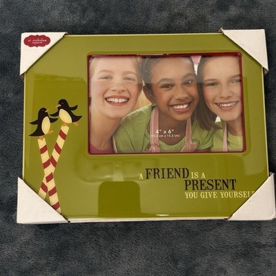 St. Nicholas Square A Friend is a present 4''x6'' Glass picture frame. New in box