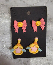 Multicolor Plastic Bow & Bottle Stud Earrings...