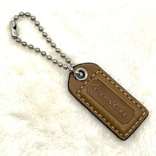 Coach keychain with Blown leather tag and ball chain
