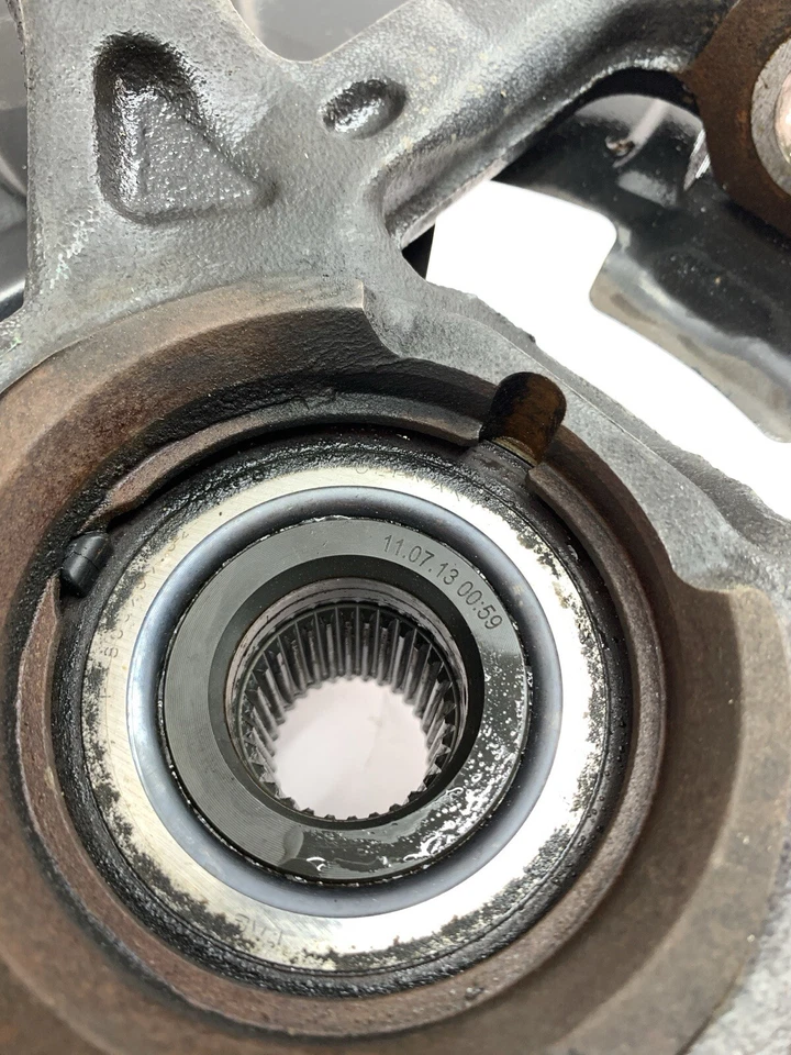 VW Volkswagen Touareg 2011-2017 7P husillo delantero derecho cojinete de rueda fabricante de equipos originales Foto 3 de 4