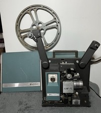 Vtg Bell and Howell 16mm Filmosound 1552 Movie Projector w/ Case  Reel TURNS ON