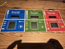 CASA DEL TERRORE, AIR PORT PANIC e AMAZONE Bandai LCD energia solare palmari