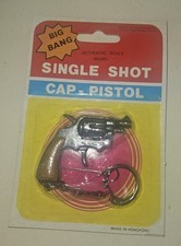 Vintage 1970s NOS Single Shot Cap Revolver Pistol Toy Keychain UNOPENED