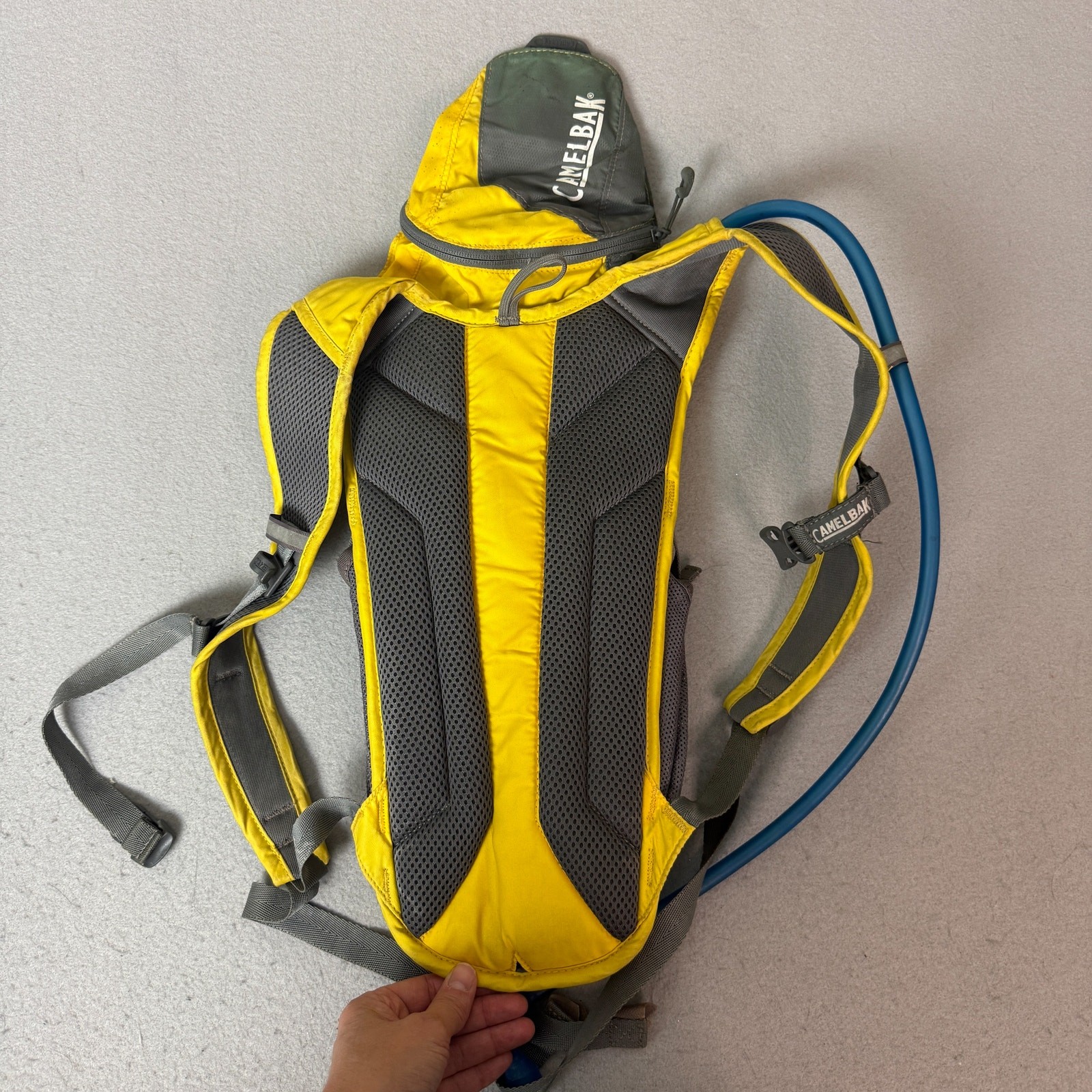(Used) CamelBak Rogue Yellow Gray Hydration Backpack Cycling Hiking Reservoir Pack (39.99 USD)