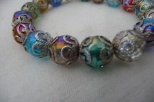 4/8A BRACELET STRETCH MULTI COLOR AB CRYSTAL BEAD WRAPPED IN SILVER TONE