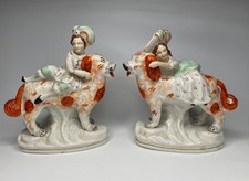 Pair Staffordshire pottery Royal Children & Dogs, c. 1850.