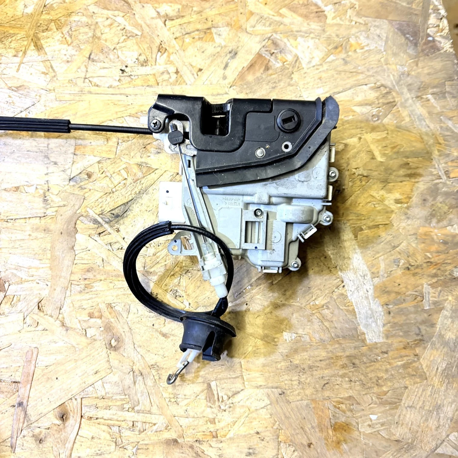 Audi rear left door lock actuator connector and mounting detail