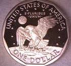 1980 S SBA $1 Proof Susan B. Anthony dollar with bald eagle, moon, stars, and “ONE DOLLAR” text.