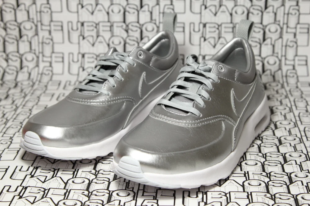Nike thea plata hotsell