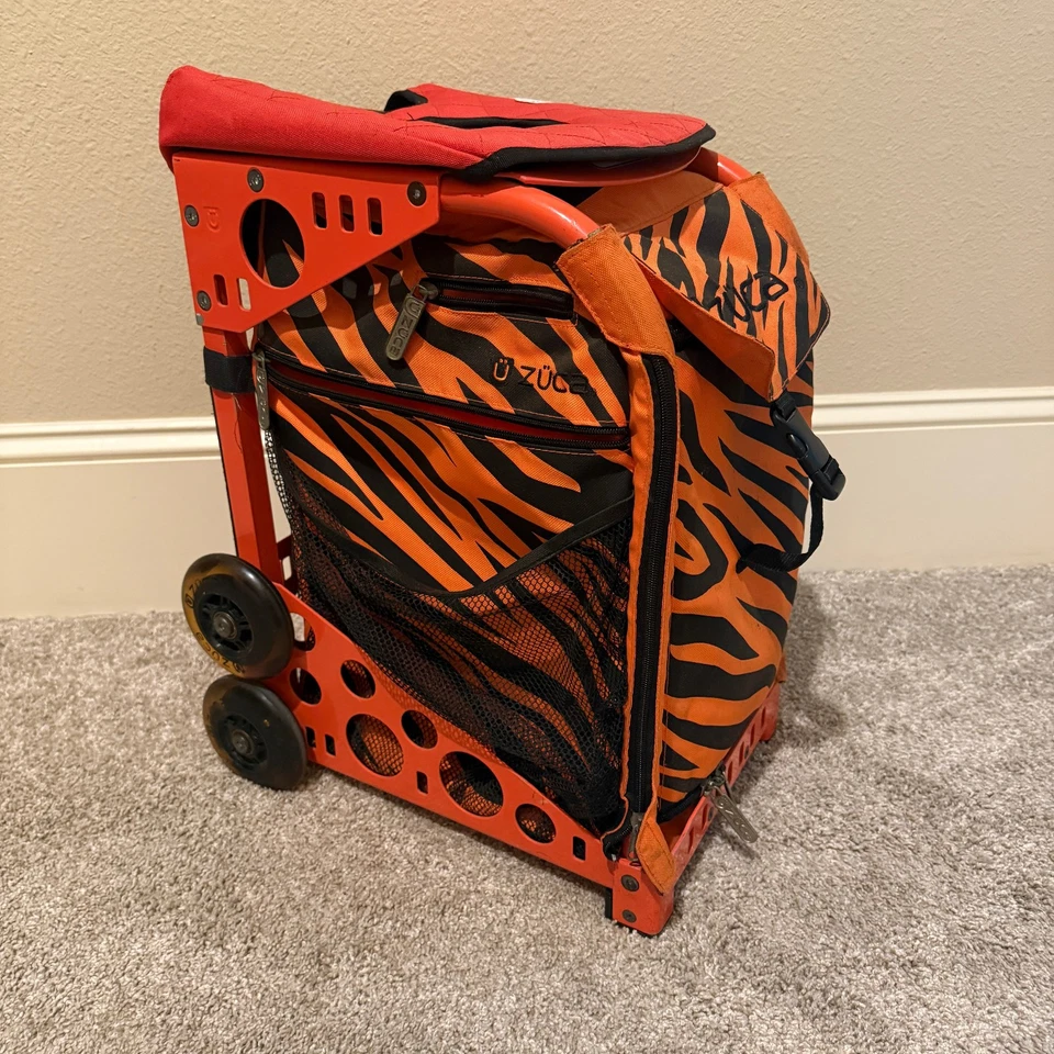 Marco de bolsa de coche deportivo Zuca naranja a rayas de tigre Foto 3 de 4