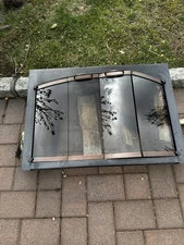 fireplace screen with glass doors