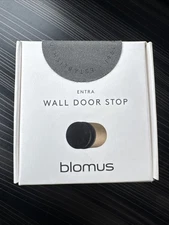Blomus Entra Brass Wall Door Stops With Metallic Finish