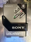 Vintage Sony Walkman WM-2  Cassette Tape Player. Reels spin, but needs cleaning.