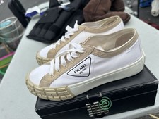 Prada Wheel gabardine sneakers in white and beige with a chunky rubber sole