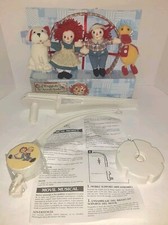 Simon  Schuster Raggedy Ann  Andy Musical Mobile Rotates To "Brahms' Lullaby"