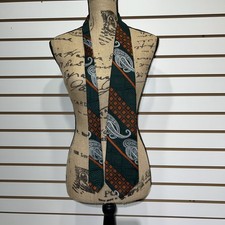 Dark Green, White Paisley And Red Squares On A Mans Tie. Wemlon By Wembley