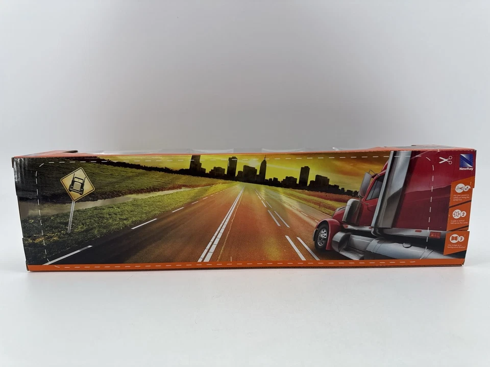 New Ray Peterbilt 387 Yellow Flatbed Semi Truck 1:43 Diecast - Image 4 of 4