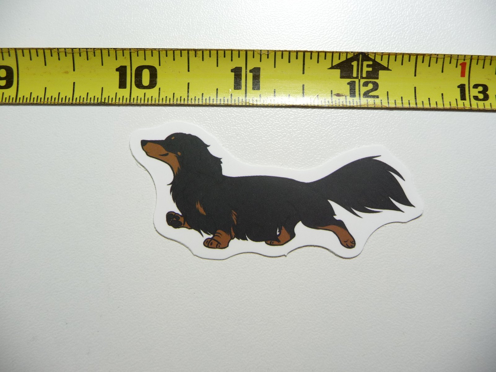 Long-Haired Dachshund Prancing Decal Sticker for Dog and Wiener Lovers