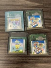 Four game Nintendo Gameboy Color bundle Pokemon Crystal Spongebob Mario Deluxe