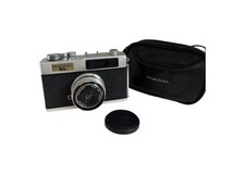Meikai EL 35mm Camera with cap and case Untested
