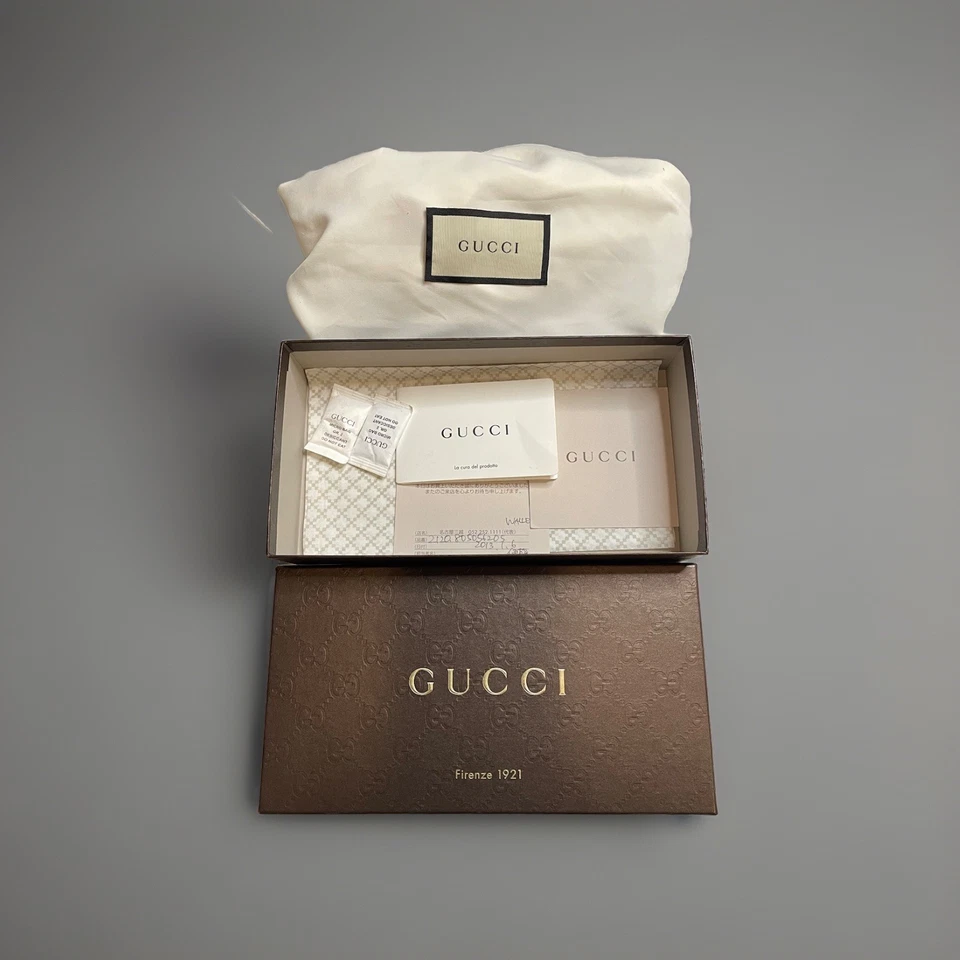 Bolso sin asas Gucci dorado metálico negro Microguccissima charol en relieve Foto 2 de 4