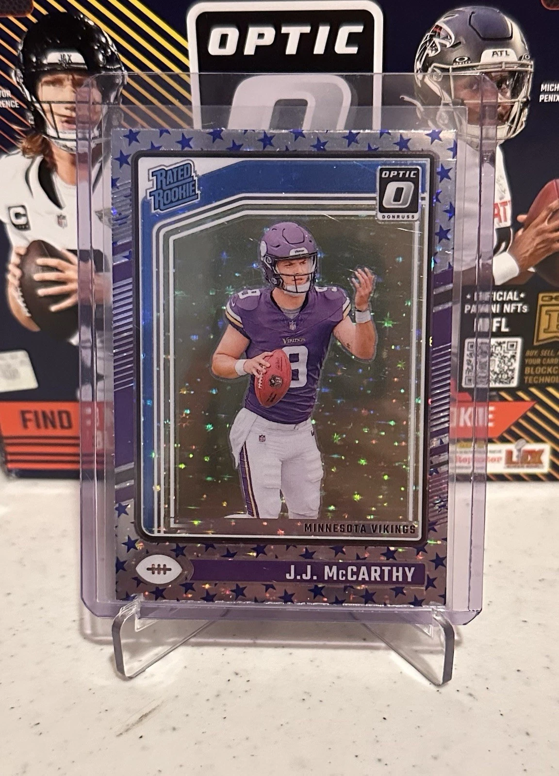 JJ McCarthy Panini Donruss Optic Rookie Primary Colors #20 Purple Stars