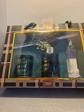 A set of home fragrances for the month of Christmas. A candle with a beautiful s