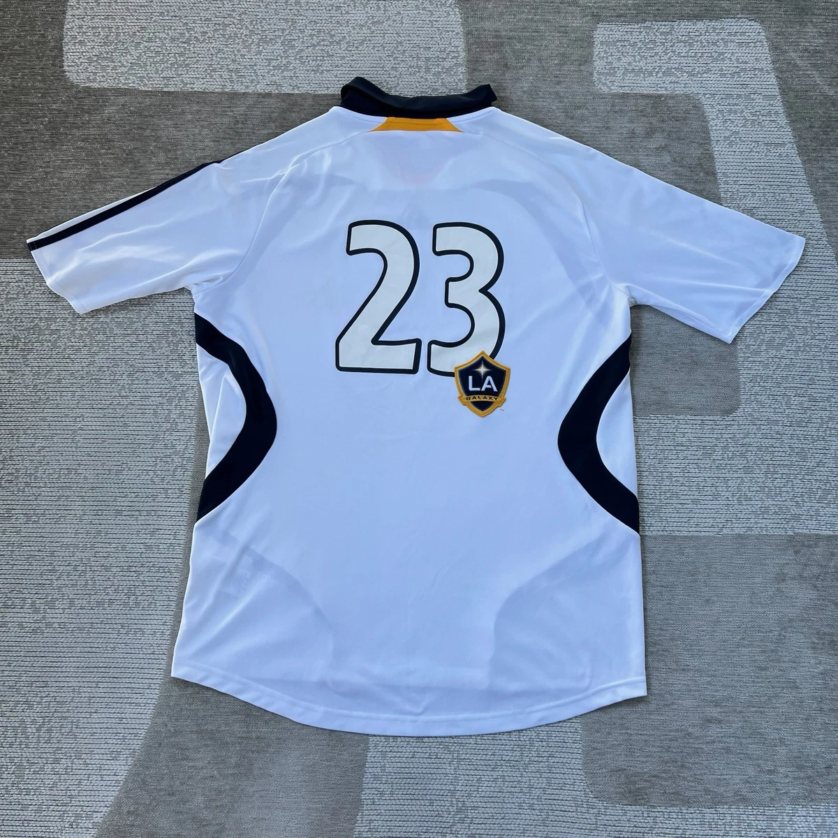 Preços baixos em Tamanho M Branco La Galaxy Roupas e Souvenirs