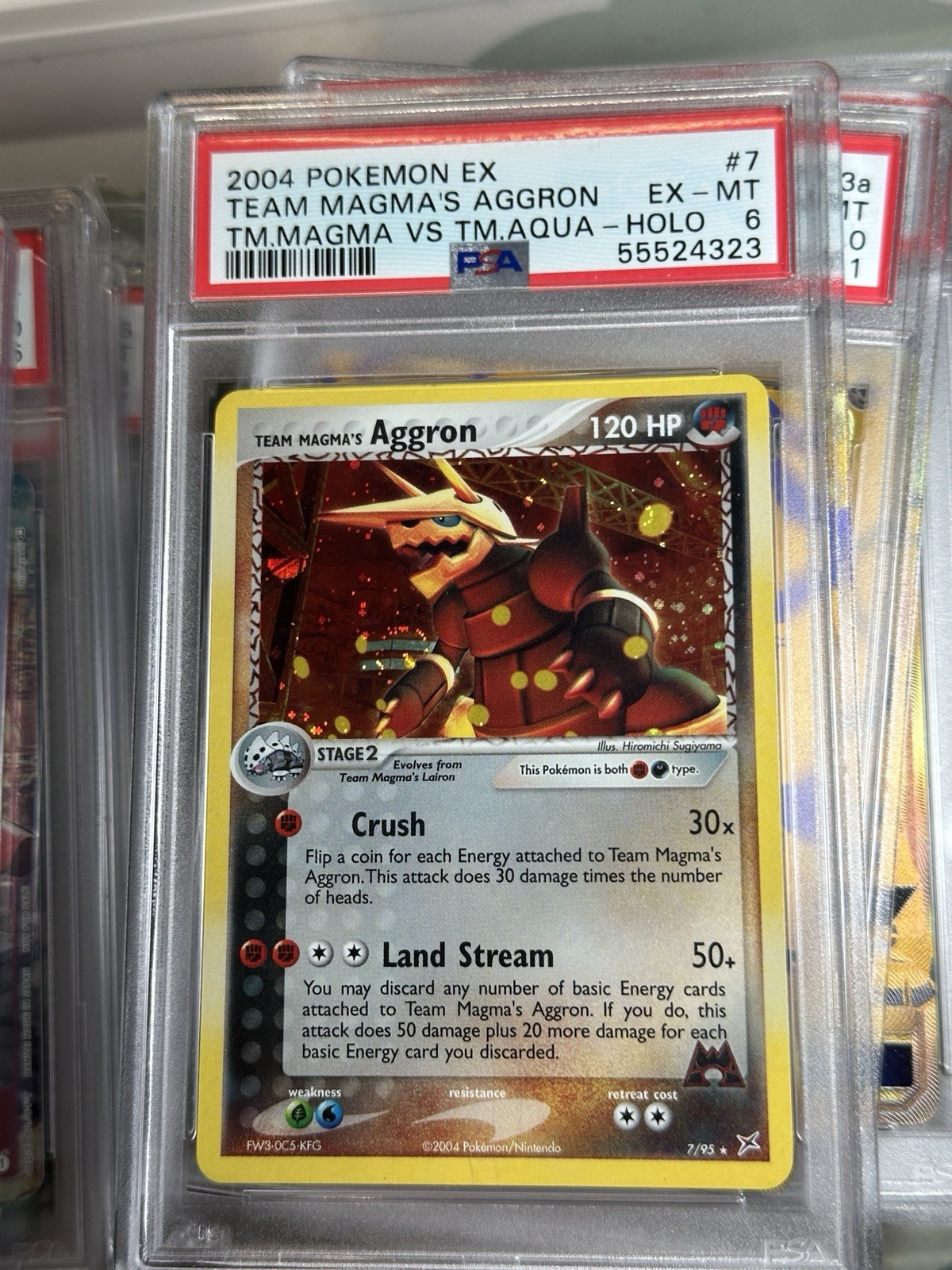 2004 POKEMON EX TEAM MAGMA VS TEAM AQUA #7 TEAM MAGMA'S AGGRON-HOLO PSA 7