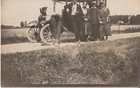 RPPC Group of people standing in front of a Model T — photo 1