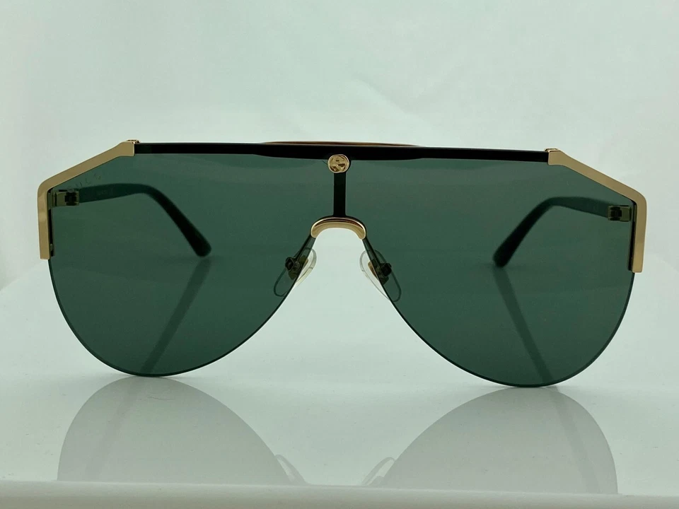 Gafas de sol Gucci GG0584S 002 Shield con lentes verdes brazos marrones Foto 3 de 4
