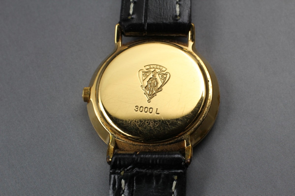 GUCCI 3000L ゴールド文字盤 レディース腕時計 Exc+4] GUCCI 3000L Black Dial Gold Quartz Woman's Watch From