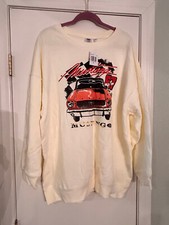 official ford mustang sweatshirt cream colored with red logo