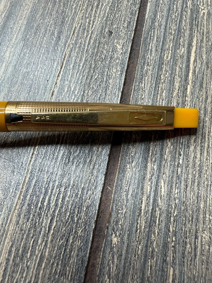 Bolígrafo amarillo vintage The Eaton Bank Colorado con detalles dorados Foto 4 de 4