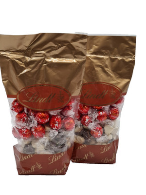 2 x 750gr. Lindt Jahrespralinen + Lindorkugeln rot MHD 08.2026 !(1000gr./14,99 )