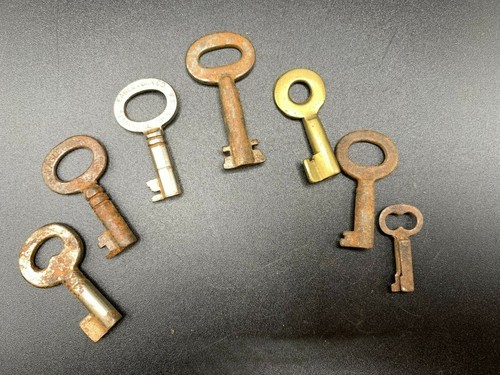 Antique lot of 7 skeleton keys steel iron brass around small mixed lot