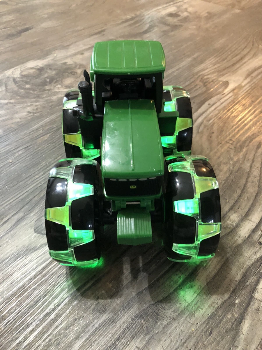 John Deere Tractor - Monster Treads Lightning Wheels Motion Activated Light  Up Truck Toy Toys Kids Ages 3 Years and Up,Green