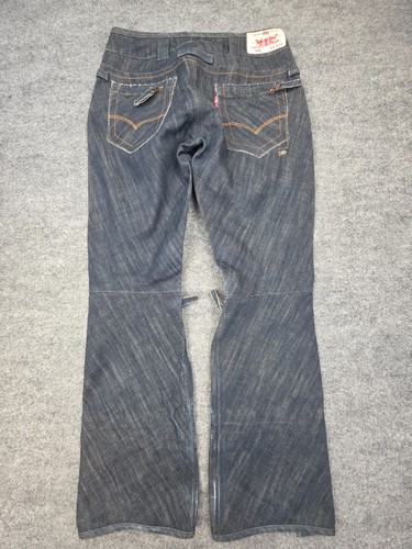 Dark blue Levi’s x 686 508 snowboard pants with red stitched arc design and small white logo on waistband.