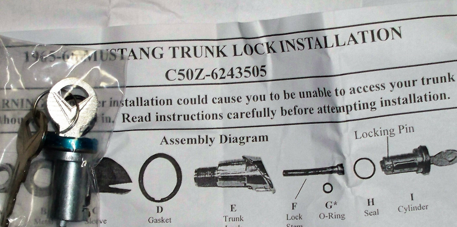 656 Mustang Dr, gaskets, Ignition Lock Bezel Trunk Lock Installed 54.